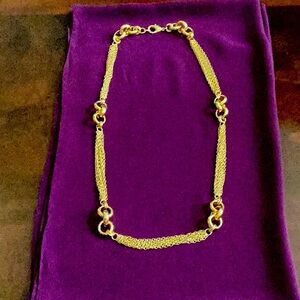 Goldtone 30” necklace with lobster claw clasp.